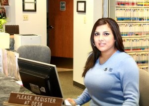 woman at front desk