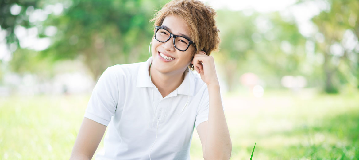 man smiling and wearing glasses