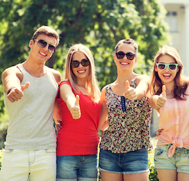 group of people giving thumbs up